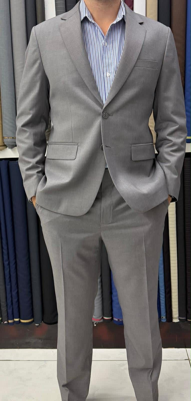 Gray business suit with striped shirt